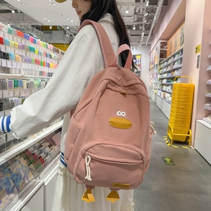 Pink corduroy backpack with cute cartoon duck design, casual school bag for daily use