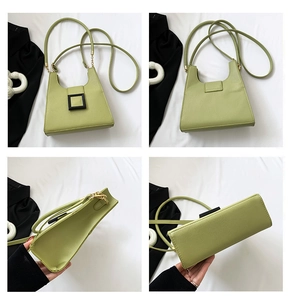 Detail view of avocado green PU leather bag featuring litchi texture and square buckle