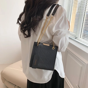 Chic black quilted chain shoulder bag for women with elegant gold hardware and square shape