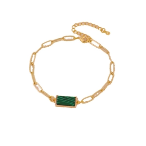 Golden paperclip chain bracelet featuring a rectangular green malachite pendant charm