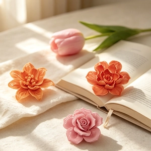 Three exquisite ceramic floral ornaments with glossy glaze finish for home decoration
