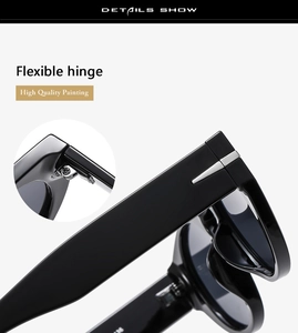 Detailed view of flexible hinges and high-quality polished black frames on sunglasses