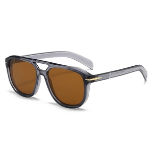 Retro round aviator sunglasses with translucent grey frames and brown tinted lenses