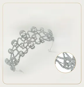 Macro detail of Gothic skull tiara showing dense rhinestone setting and alloy base structure