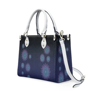 Detailed side view of ethnic tote bag with blue mandala print and white handles