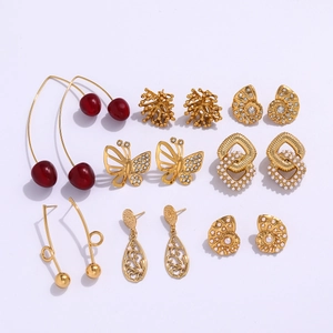Set of 8 minimalist irregular geometric butterfly and cherry earrings in gold finish