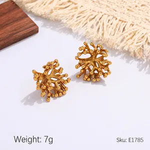 Detail view of 2cm golden coral-shaped textured stud earrings weighing 7g