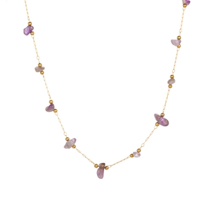 Gold chain necklace set with irregular purple crystal stones and small golden beads