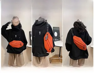 Three-way orange canvas bag showing crossbody, waist, and shoulder carry modes