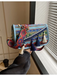 Ethnic style shoulder bag with colorful embroidery patterns and wide adjustable strap