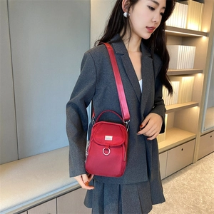 Fashionable red nylon mini crossbody phone bag with adjustable shoulder strap for women