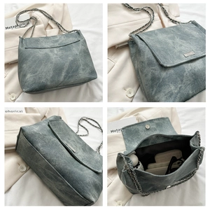 Detailed interior of the vintage chain shoulder bag showing large capacity for essentials