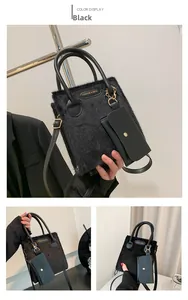 Detail of black faux fur square tote bag with mini pouch and adjustable shoulder strap