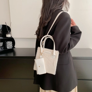 Chic white faux fur tote bag with top handles and matching coin purse for women