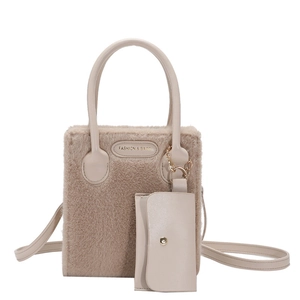 Minimalist beige quilted plush crossbody bag with leather strap and matching small pouch
