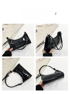 Detail view of black glossy crocodile pattern shoulder bag from multiple angles