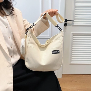 Chic off-white large canvas tote bag with adjustable strap and mini round coin purse