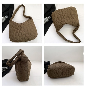 Detailed views of brown quilted tote bag with floral pattern from four different angles