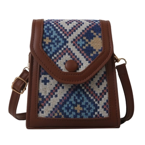 Retro ethnic style crossbody phone bag with geometric woven pattern and brown leather trim