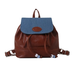 Retro contrast color mini backpack with brown faux leather and blue denim flap detail