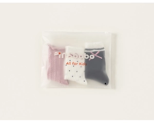 Three-pack kids socks set with bow details and polka dots in frosted zipper gift bag