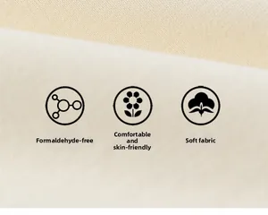 Detail of soft beige knit fabric featuring skin-friendly texture and non-toxic materials