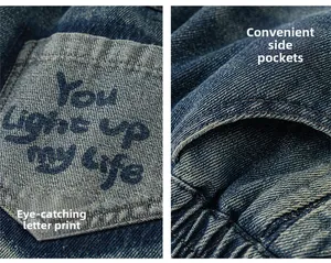 Detail of dark blue denim pants with white letter print and functional side pockets
