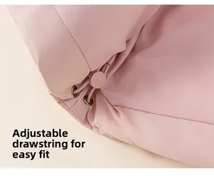 Détail de l'ourlet de la doudoune rose avec cordon de serrage élastique réglable