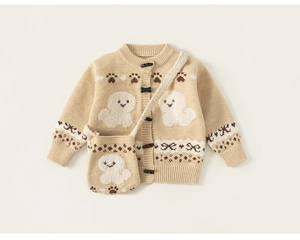 Detail of beige knit cardigan with horn buttons and matching cartoon puppy crossbody bag