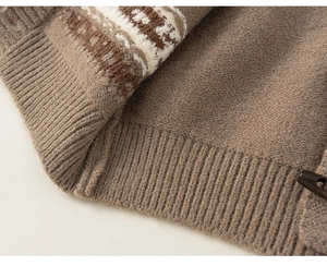 Detailed view of brown knit cardigan featuring Fair Isle patterns and a horn button closure