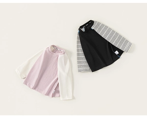 Detail view of pink and black raglan sleeve cotton t-shirts for kids in soft spring fabric