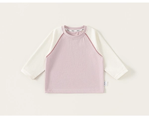 Detail of pink and beige raglan long sleeve cotton T-shirt with fine stitching
