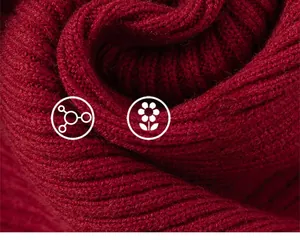 Macro shot of red knit sweater detailing soft fabric texture and premium weaving