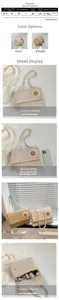 Detail of straw crossbody bag with daisy decor showing capacity for phone and umbrella