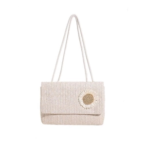 Minimalist straw woven crossbody bag with sunflower detail for summer beach vacations