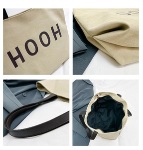 Détails du cabas en toile beige avec imprimé HOOH, anses en cuir et doublure interne