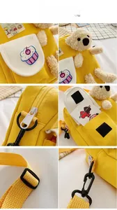 Détails du sac en toile jaune avec ours en peluche, poche cupcake et fermetures éclair