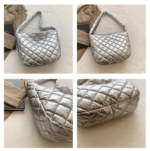 Detail shots of large silver quilted hobo bag from front and side angles