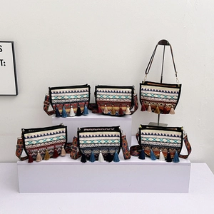 Set of bohemian style crossbody bags with geometric patterns and colorful tassels