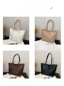 Detail view of four color options for the solid minimalist faux leather tote bag
