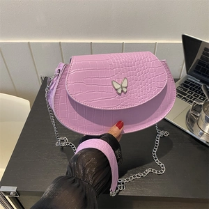 Lavender crocodile embossed mini saddle bag with butterfly buckle and silver chain strap