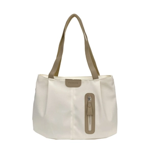Minimalist beige canvas tote bag with khaki straps and large capacity for daily commuting