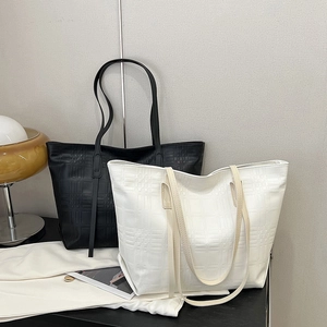 Minimalist large leather tote bags with embossed checkered texture in black and white colors