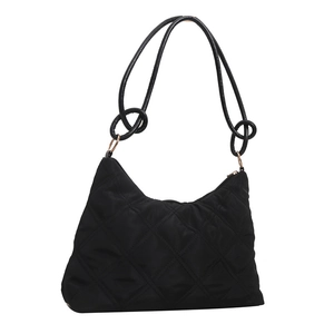 Minimalist black quilted nylon shoulder bag with elegant knotted straps and zip closure
