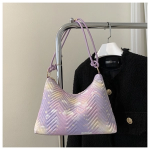 Detailed V-quilted purple gradient handbag featuring butterfly and rainbow print motifs