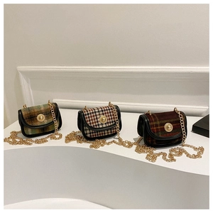 Three vintage plaid tweed saddle bags with gold metal chains and leather trim detail