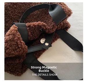 Detail view of plush brown faux fur bag showing strong magnetic silver metal buckle closure