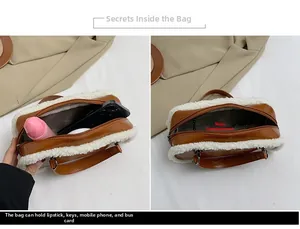 Detail view of winter brown leather and white faux fur bag with spacious inner compartment