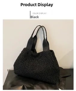 Detailed texture of black plush faux shearling fabric on a stylish winter bucket bag