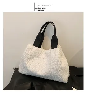 Detail view of white lamb-like fuzzy fabric on bucket bag with durable black carrying handle